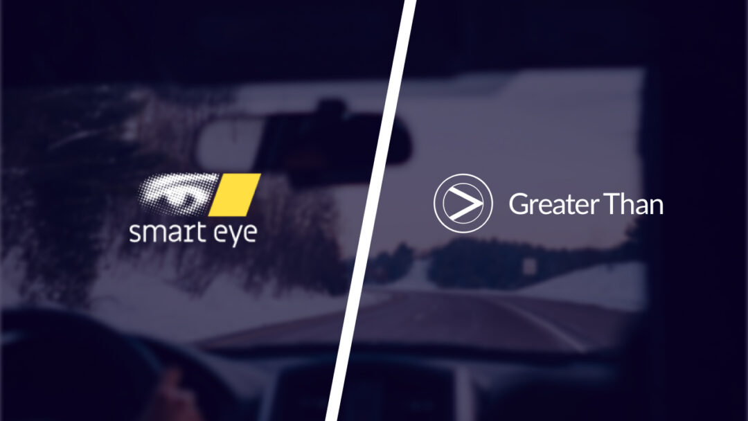 Smart Eye and Greater Than logo on a image background showing from inside a car driving on a snowy landscape