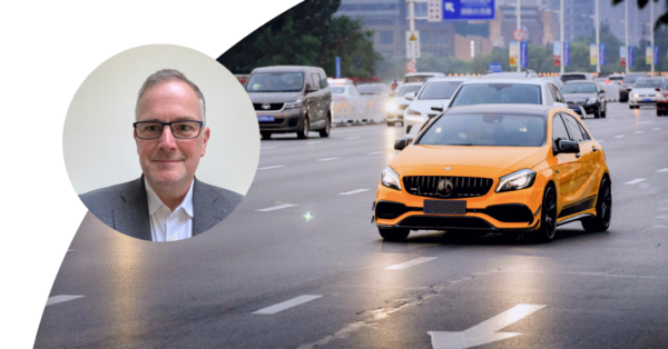 Yellow car driving on a freeway
