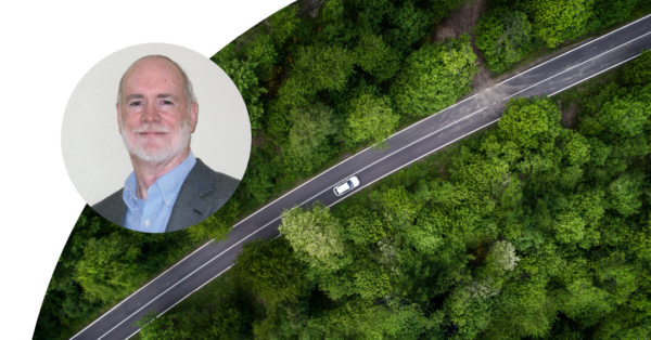 Car is driving in nature and profile picture of Jim Noble