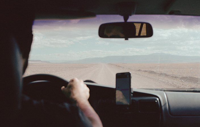 Person driving a car