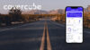 A road with mountains and a phone displaying the Covercube app and the Covercube logotype