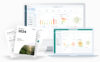 ESG data visualizations on desktop and laptop screens, with printed 2024 ESG reports in the foreground showing climate impact and risk metrics for a company fleet.