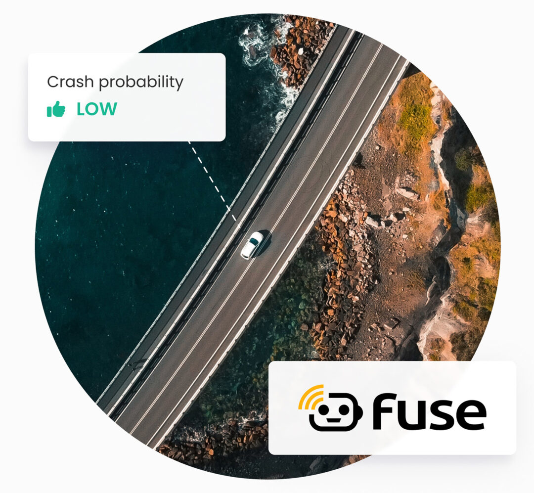 A car driving on a road with a card showing