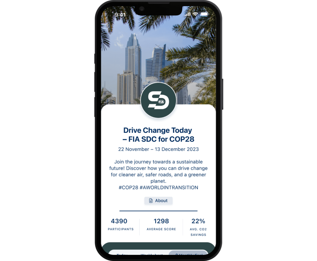 Drive change today - FIA SDC for COP28 app shown on phone.