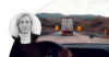 Person driving in a car behind a truck on a small road in a fall landscape. Profile image of Johanna Forseke