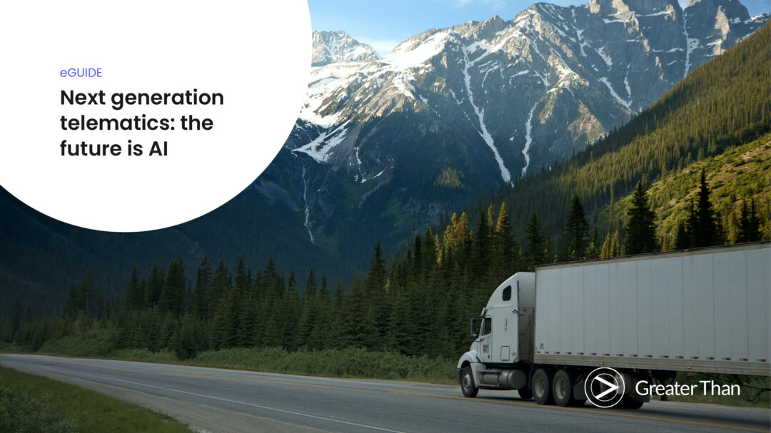 White truck driving on a road with snow-capped mountains in the background. Cover for eGuide "Next generation telematics: the future is AI"