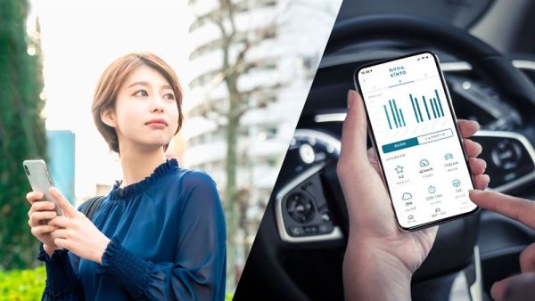 Woman holding her phone, phone is showing KINTO app