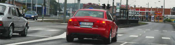 Red car is practicing driving on the streets