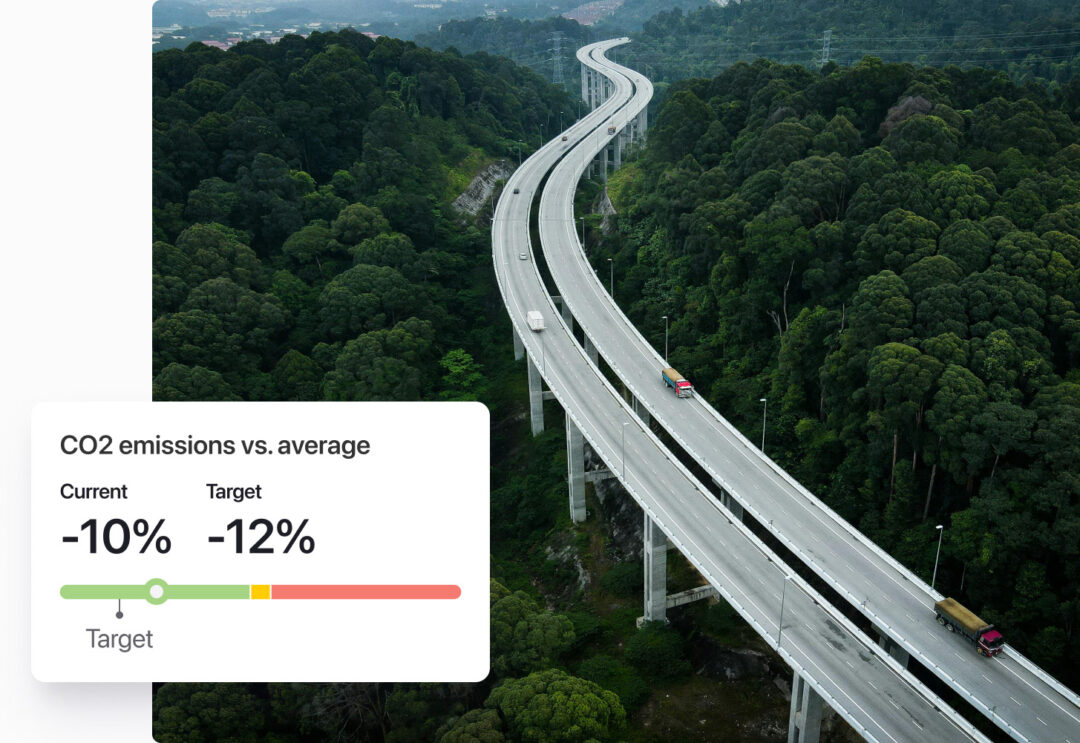 Cars driving on a bridge over forest. A widget showing CO2 emission stats by the side