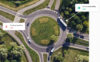 Roundabout with markers saying 